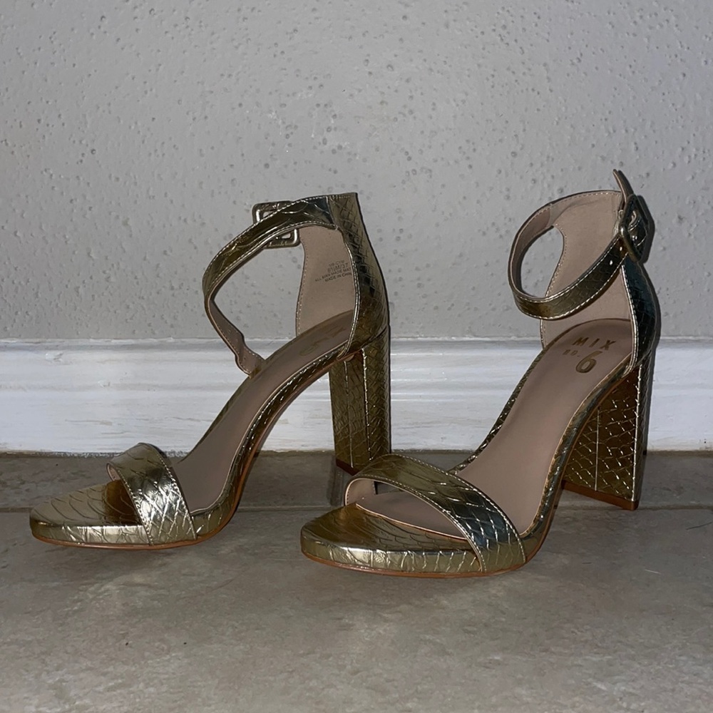 Gold heels. Never worn!